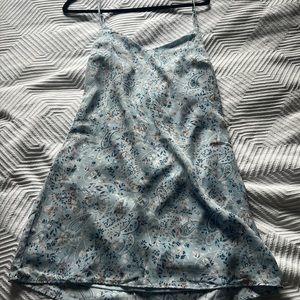 Blue, floral mini dress with tie back. Worn once for graduation. Size M